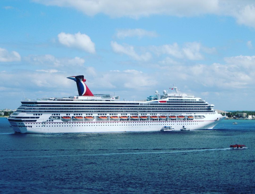 Carnival Conquest at anchor in Grand Cayman