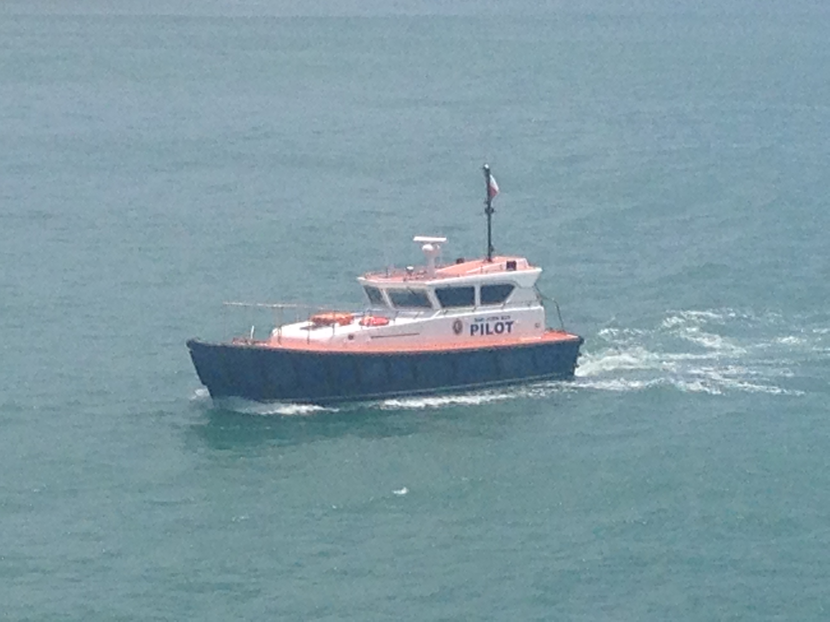 The San Juan Bay Pilot boat approaches to board the ms Veendam