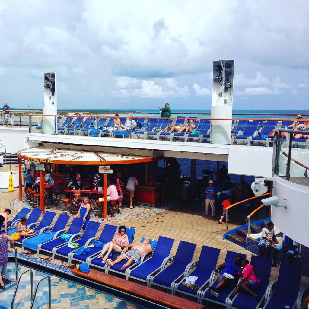 The pool deck on the Carnival Liberty starting to fill up.