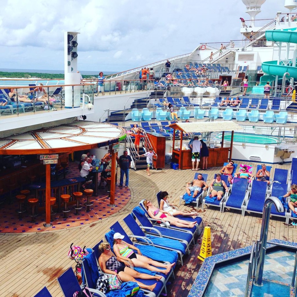 The pool deck on the Carnival Liberty starting to fill up.