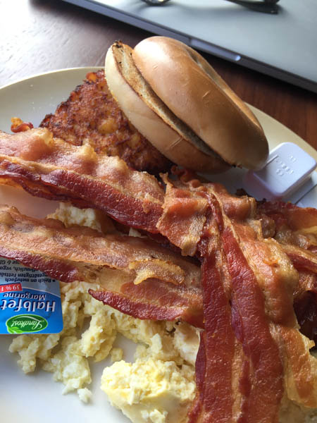 Plenty of bacon in thes breakfast from the Windjammer Cafe on Quantum of the Seas