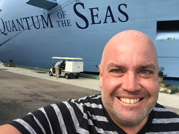 Yours truly standing outside the Quantum of the Seas while docked in Nassau