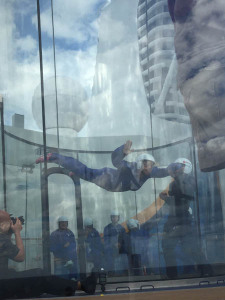 A guest skydiving in the iFly simulator on Quantum of the Seas