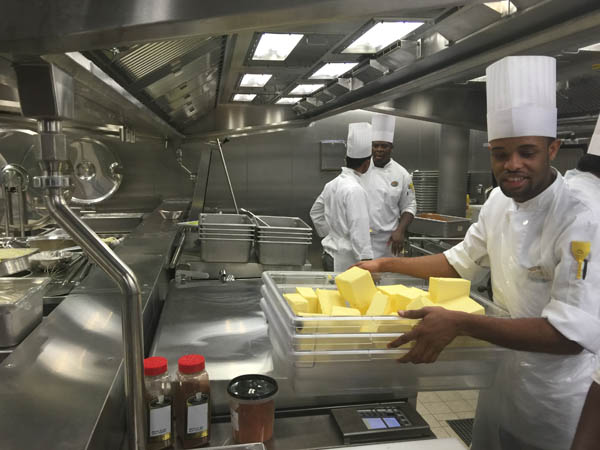 Chefs onboard Quantum of the Seas working in one of the ship's galleys