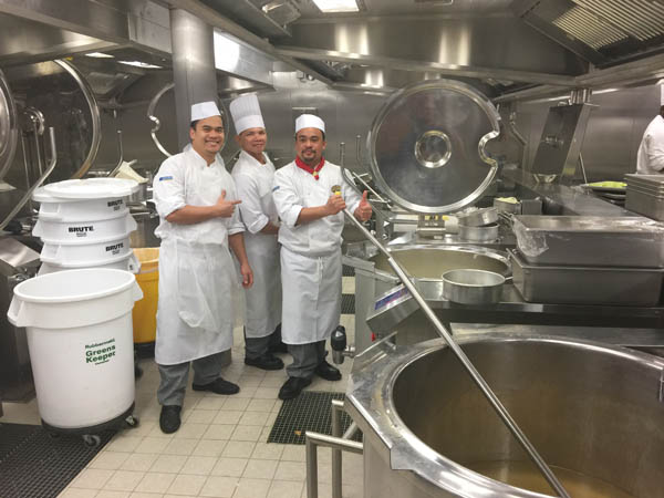 Chefs onboard Quantum of the Seas working in one of the ship's galleys