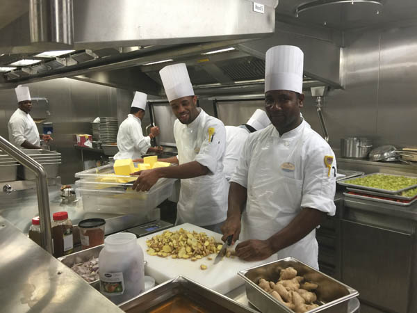 Chefs onboard Quantum of the Seas working in one of the ship's galleys