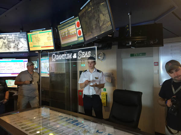 One of the Deck Cadets on Quantum of the Seas leads us around the Command Center on the bridge