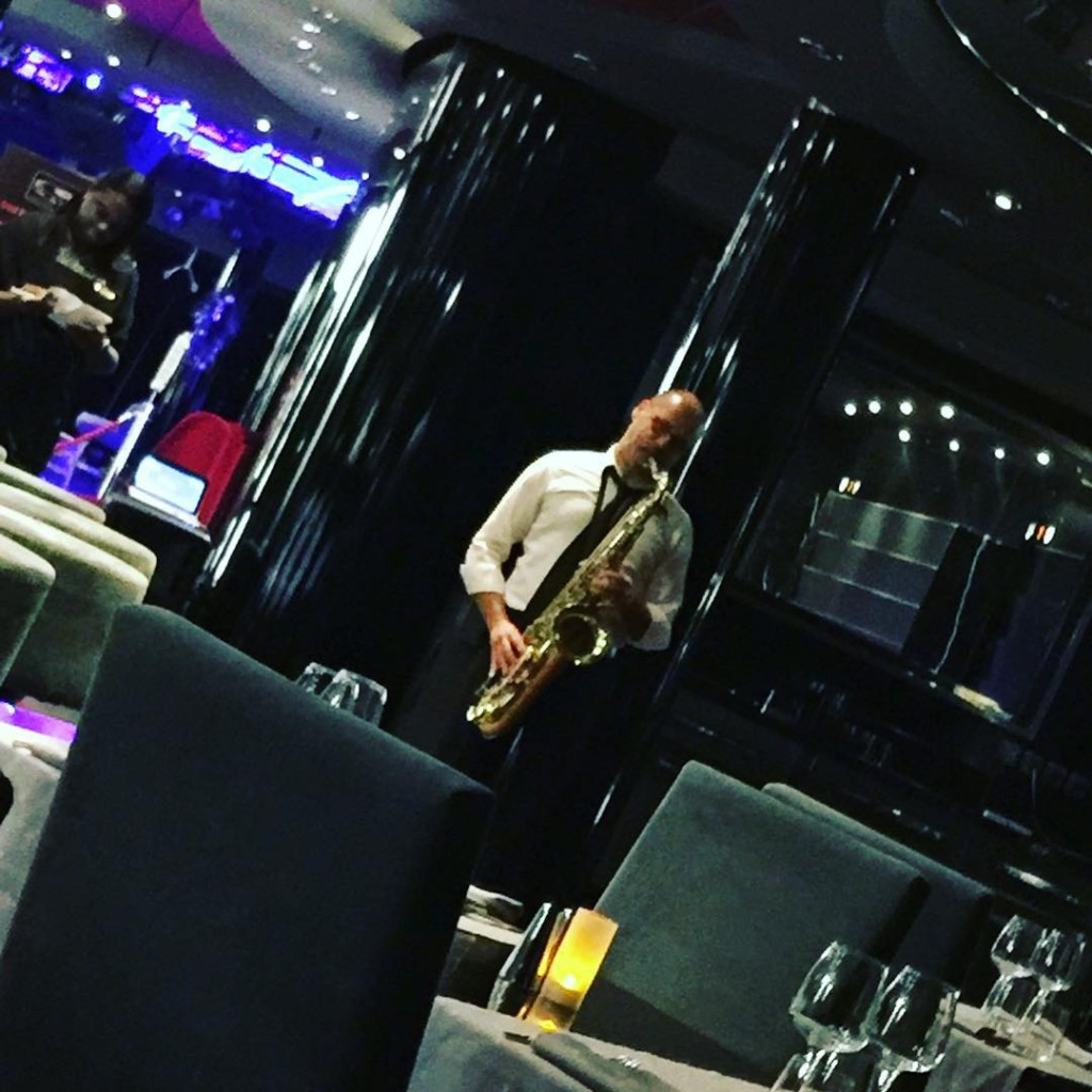 A sax player entertains during dinner in the Galaxy Restaurant onboard MSC Divina