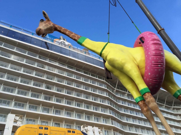 Anthem of the Seas' newest resident - a giraffe wearing a swimsuit and buoy. Photo credit: Royal Caribbean