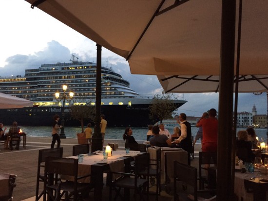 The Holland America Line cruise ship ms Nieuw Amsterdam sails the Giudecca Canal by the Hilton Molino Stucky in Venice Italy on July 27, 2015. Photo credit: Idan Rotem.