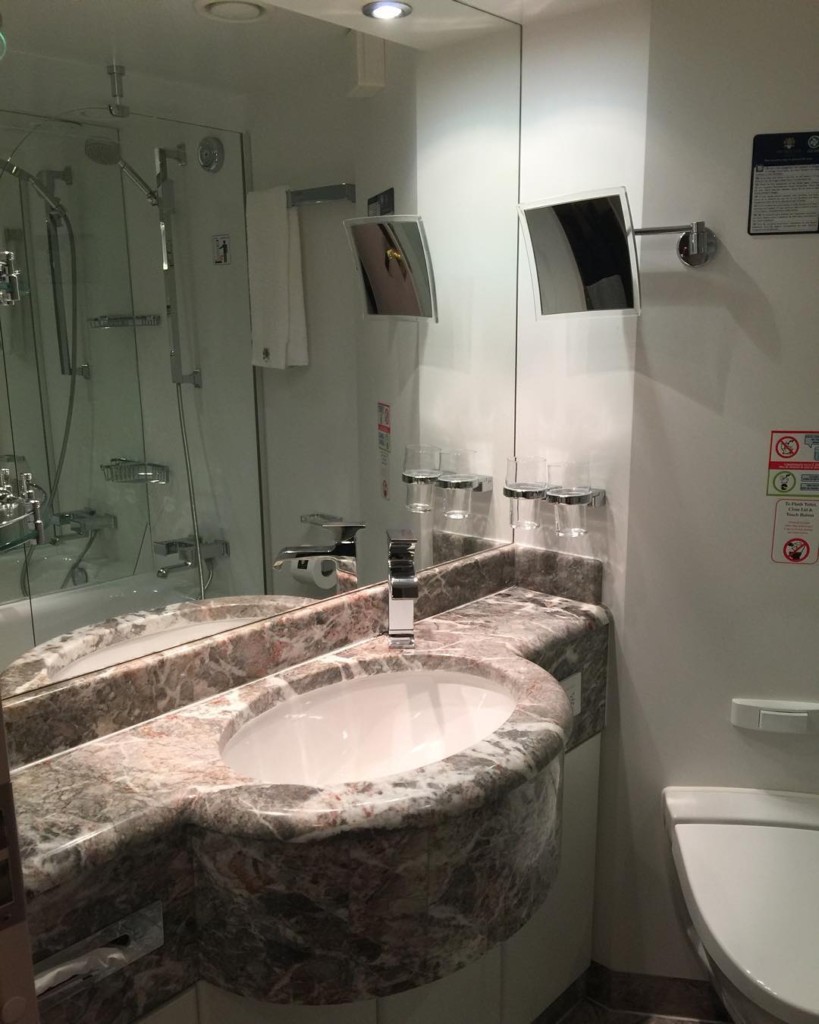 A Balcony Stateroom Bathroom in the Yacht Club on MSC Divina