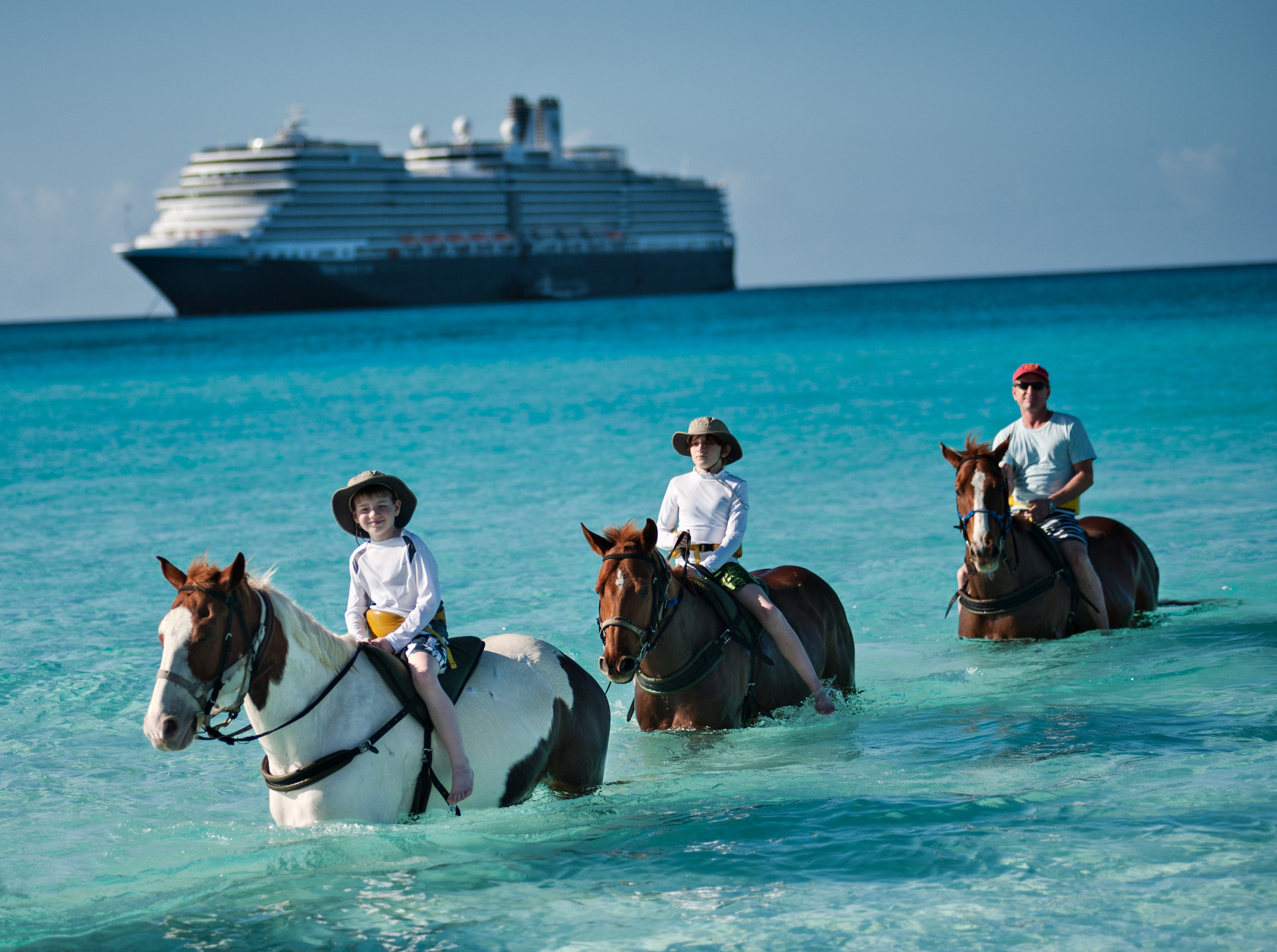 Horseback Riding at Half Moon Cay with the Eurodam in the background. Photo credit: Holland America Line