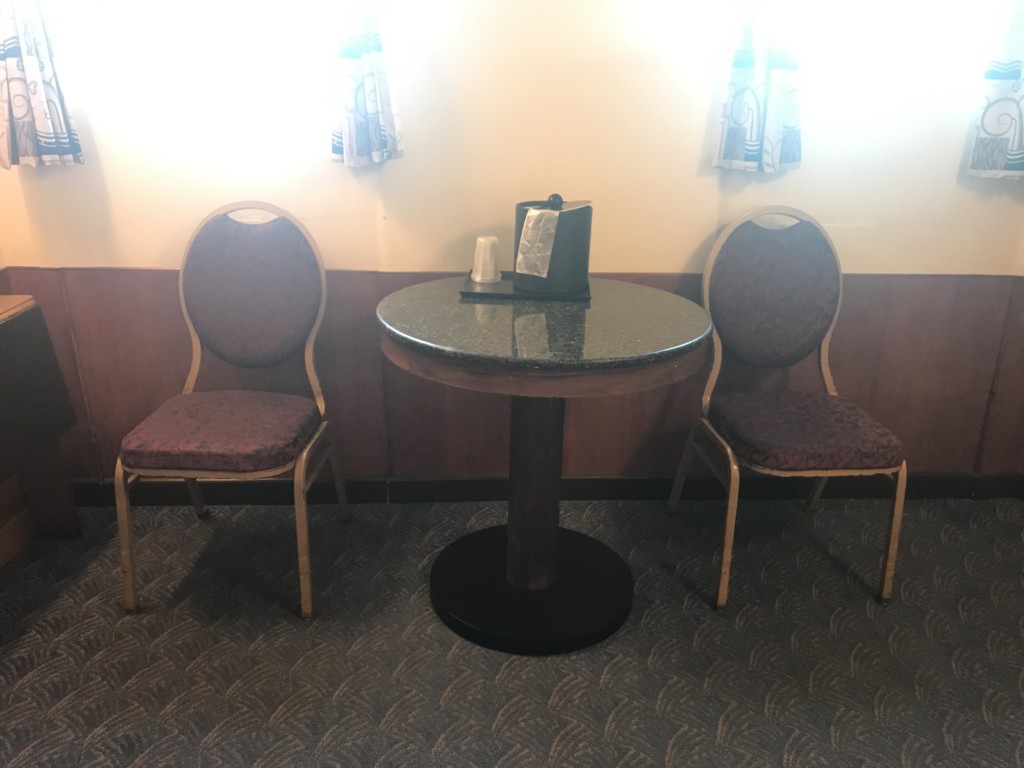 No, I'm not in a coffee shop, these banquet chairs are actually considered furniture in my stateroom on the Queen Mary