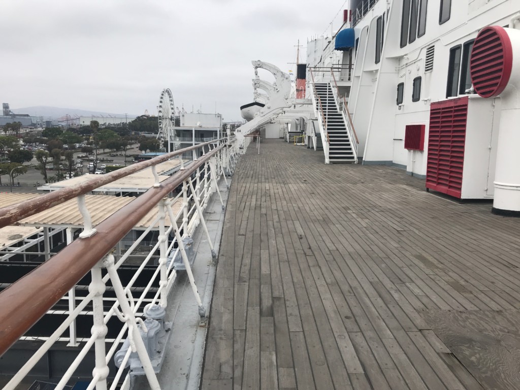 A look at the port side Sun Deck on the Queen Mary. Notice the wood deck that has been repaired by simply laying down a piece of plywood.