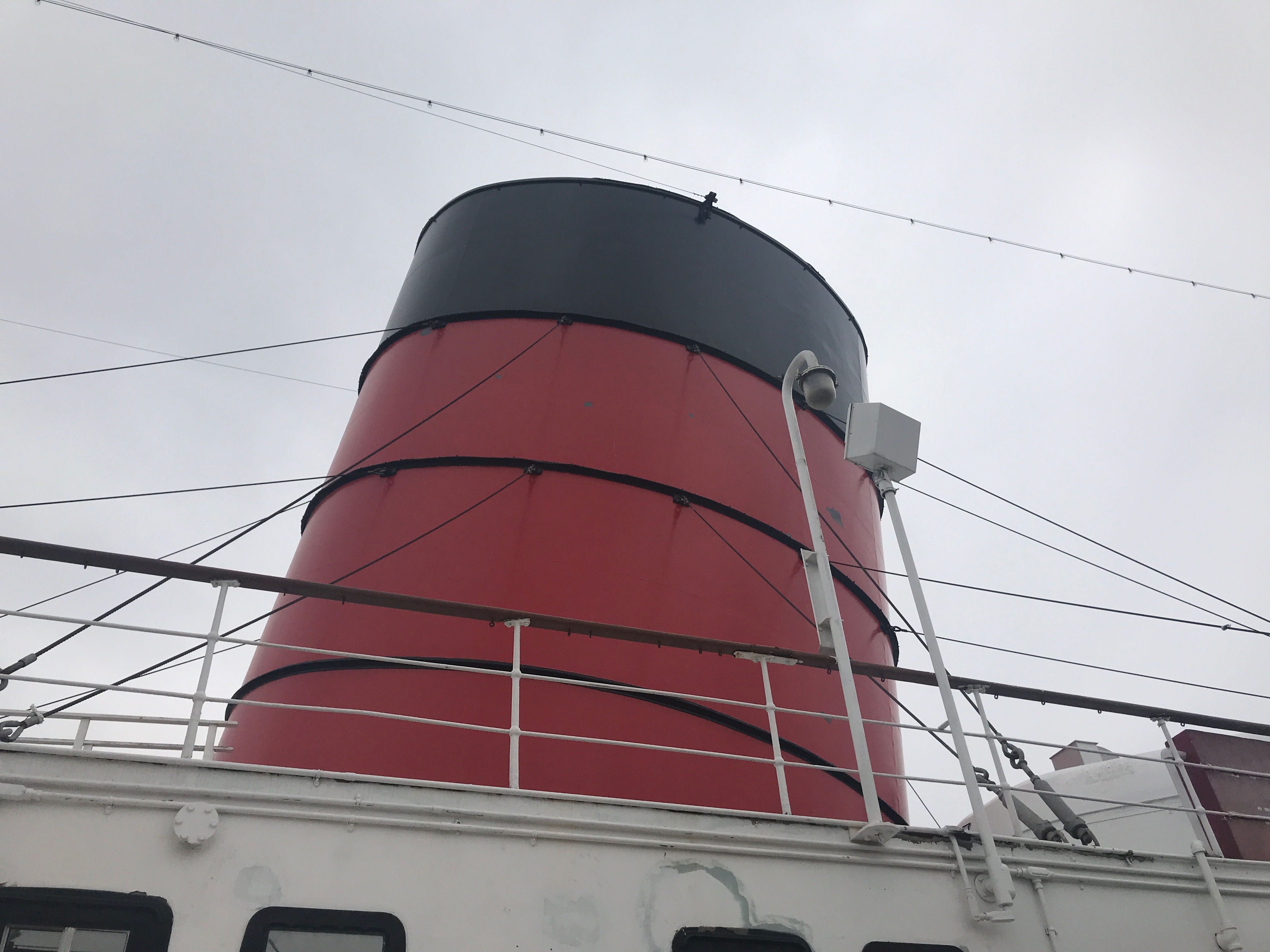 A freshly painted third funnel on the Queen Mary