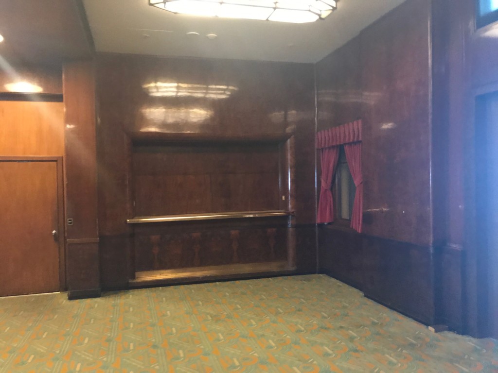 An area that may be a coat room or a bar in the Royal Salon on the Queen Mary