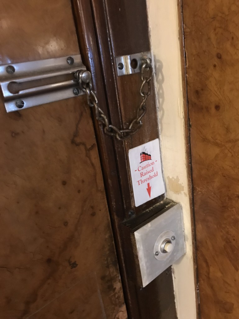 Safety latch on the inside of the stateroom door for room M-033 on the Queen Mary