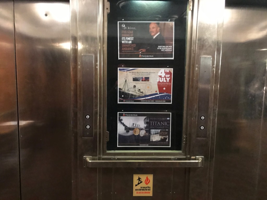 A working bank of passenger elevators on the Queen Mary