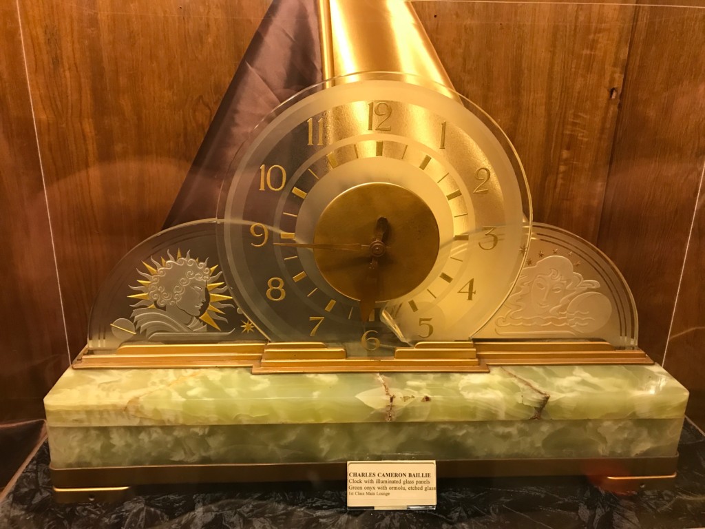 A Charles Cameron Bailie clock with illuminated glass panels, green onyx and etched glass that was in the 1st Class Main Lounge on the Queen Mary