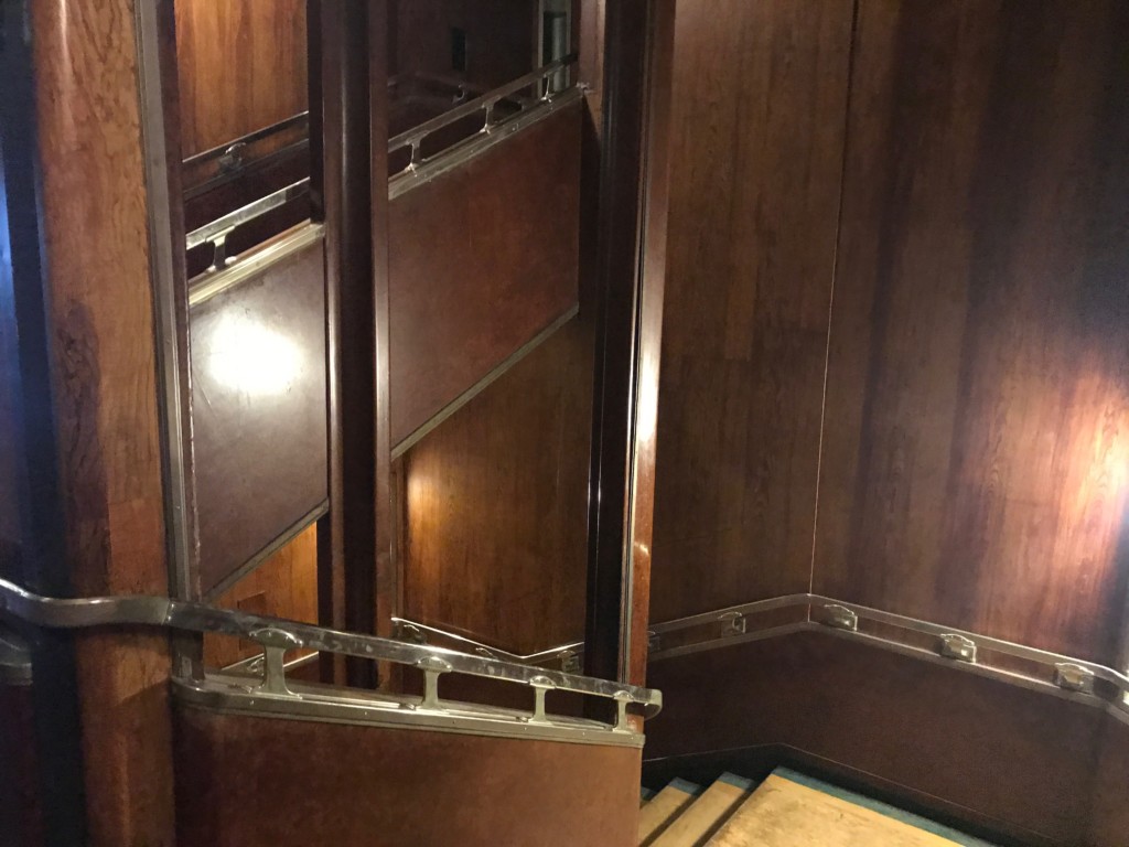 Wood and metal are featured in many of the Queen Mary's stairwells