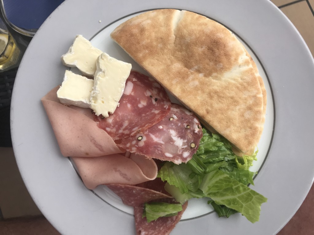 An assortment of meats and cheese served in the cabana on MSC Seaside