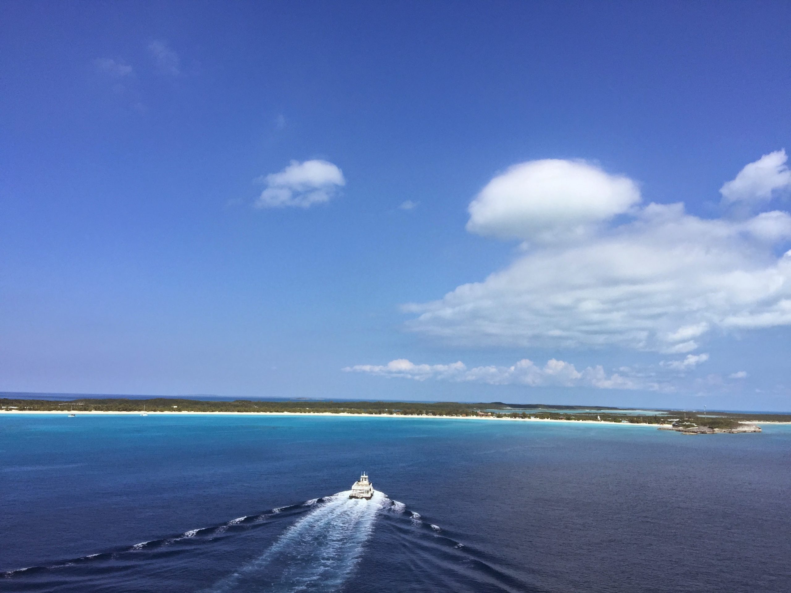 A tenderboat heads from the ship to Half Moon Cay