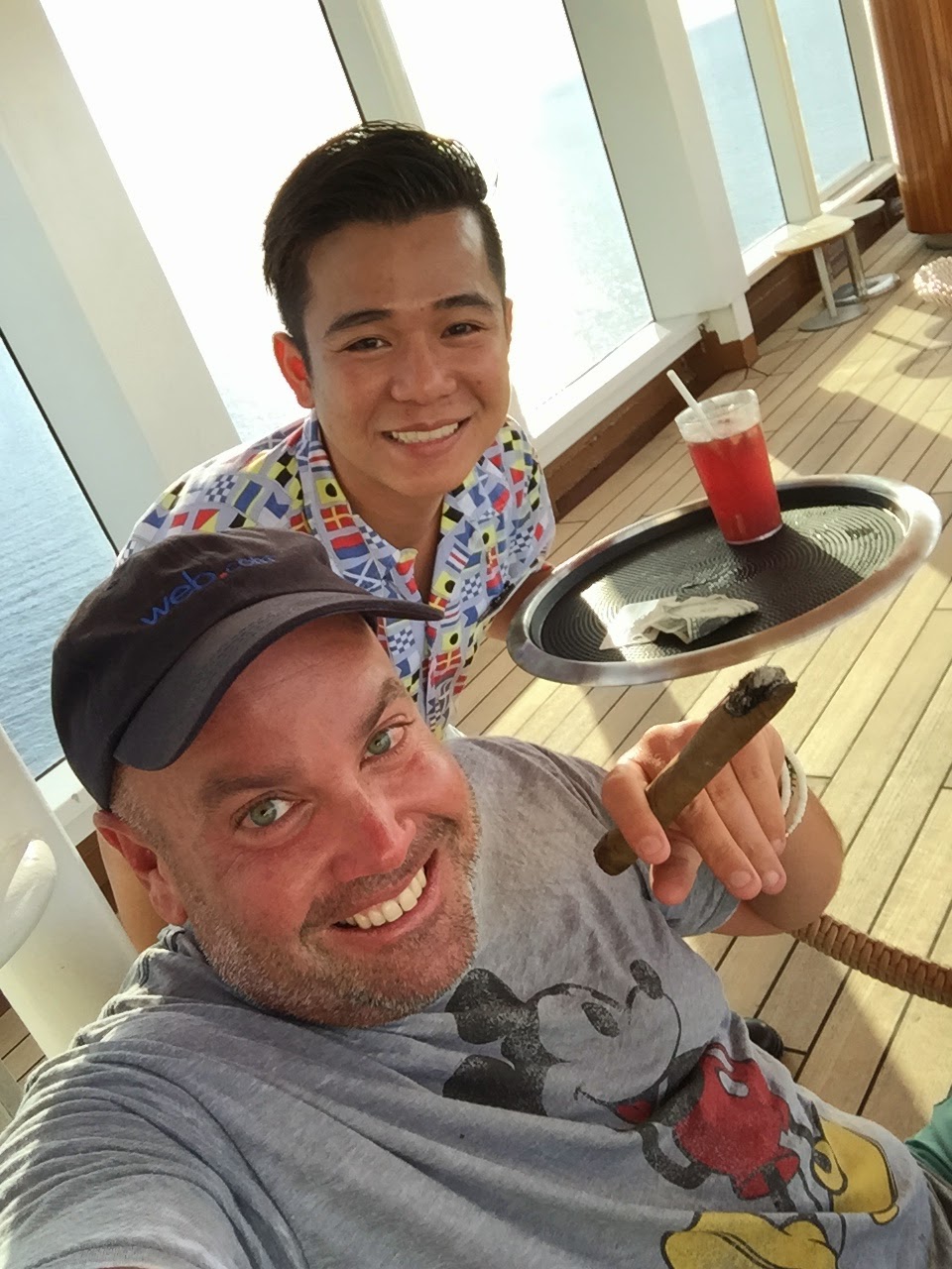 Always friendly service onboard a Holland America line cruise ship! Here's yours truly enjoying a leisure afternoon chatting with one of the crew.