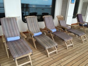 Wooden steamer chairs on the Promenade Deck on Noordam