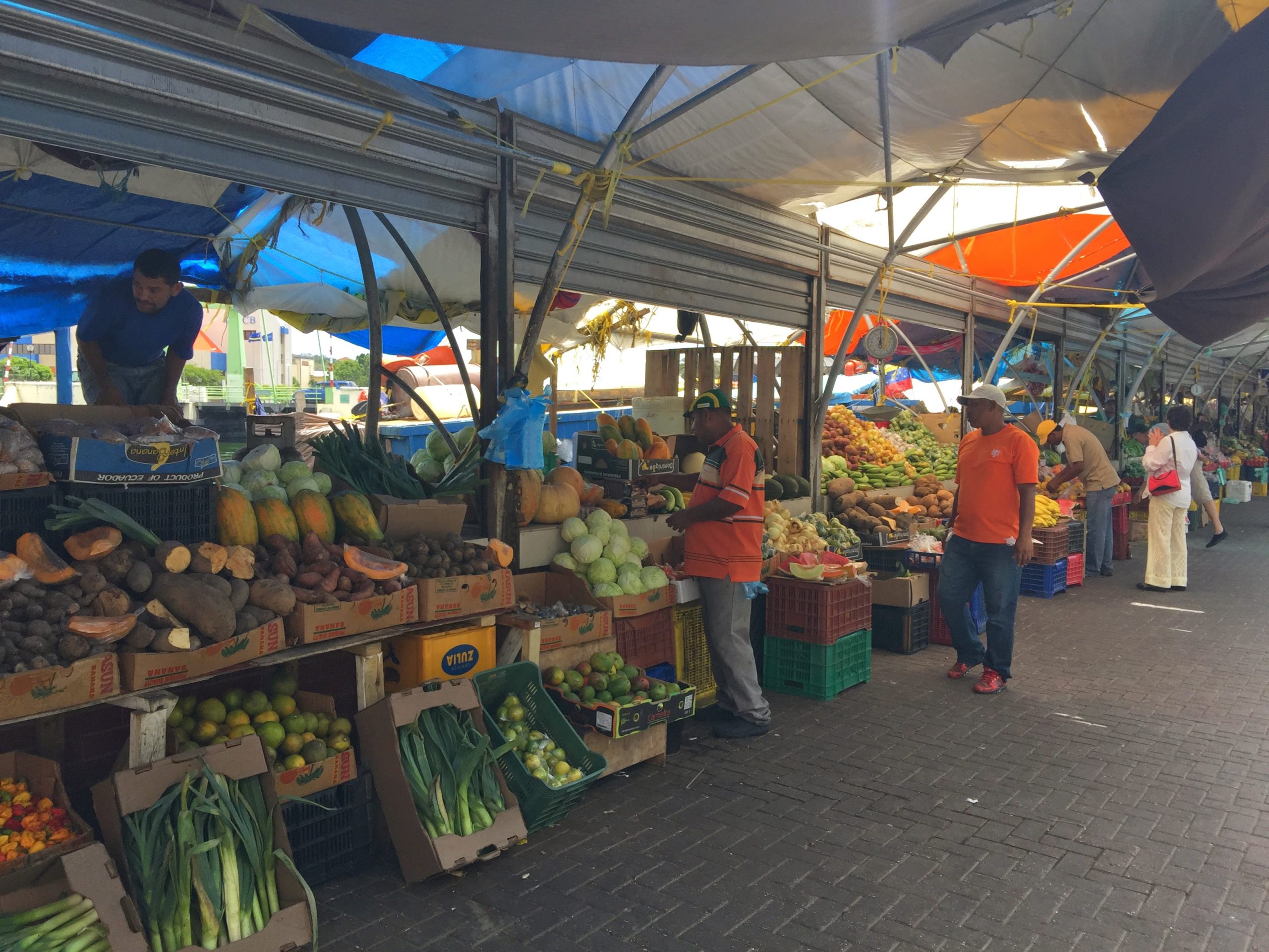 The floating market in Curacao features vendors selling fresh produce as well as fish brought in daily. 