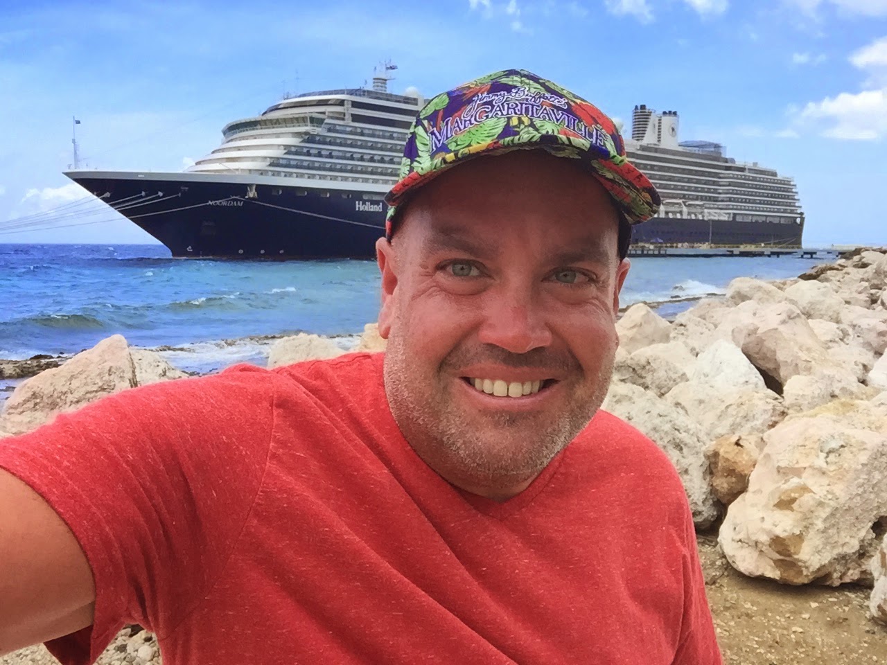 Yours truly in Curacao with the Holland America Noordam in the background