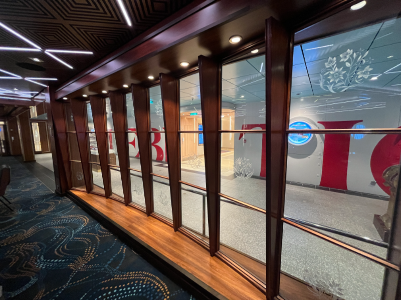 An original glass wall from the TSS Mardi Gras on display outside Golden Jubilee on Carnival Celebration