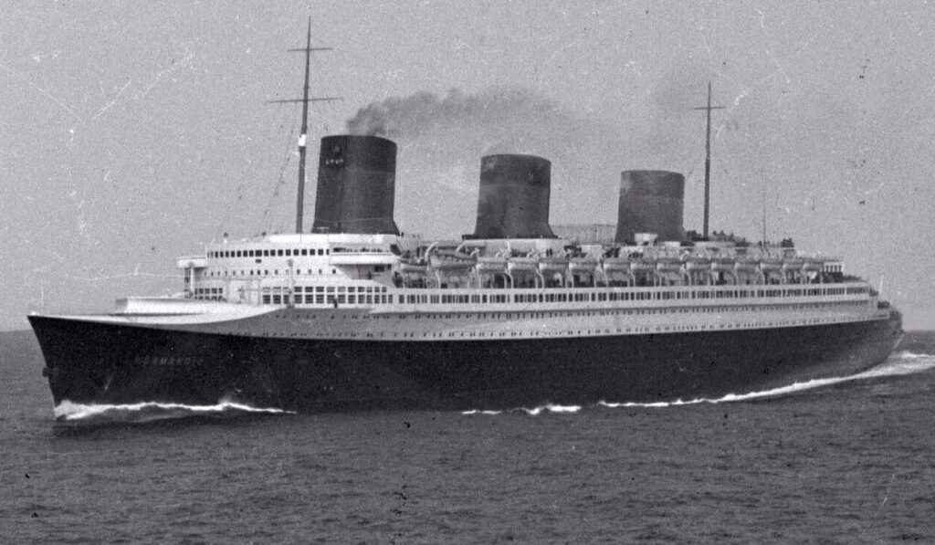 SS_Normandie_at_sea_view.JPG: *SS_Normandie_at_sea.jpg: Vick the Viking derivative work: Altair78 (talk) derivative work: Altair78, CC BY 2.0, via Wikimedia Commons