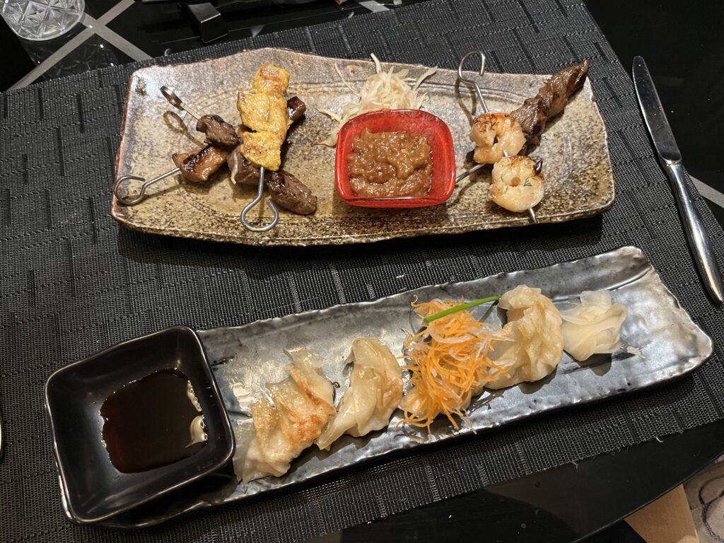 Satay Sampler and Shrimp & Lobster Potstickers from Tamarind on Holland America's Rotterdam