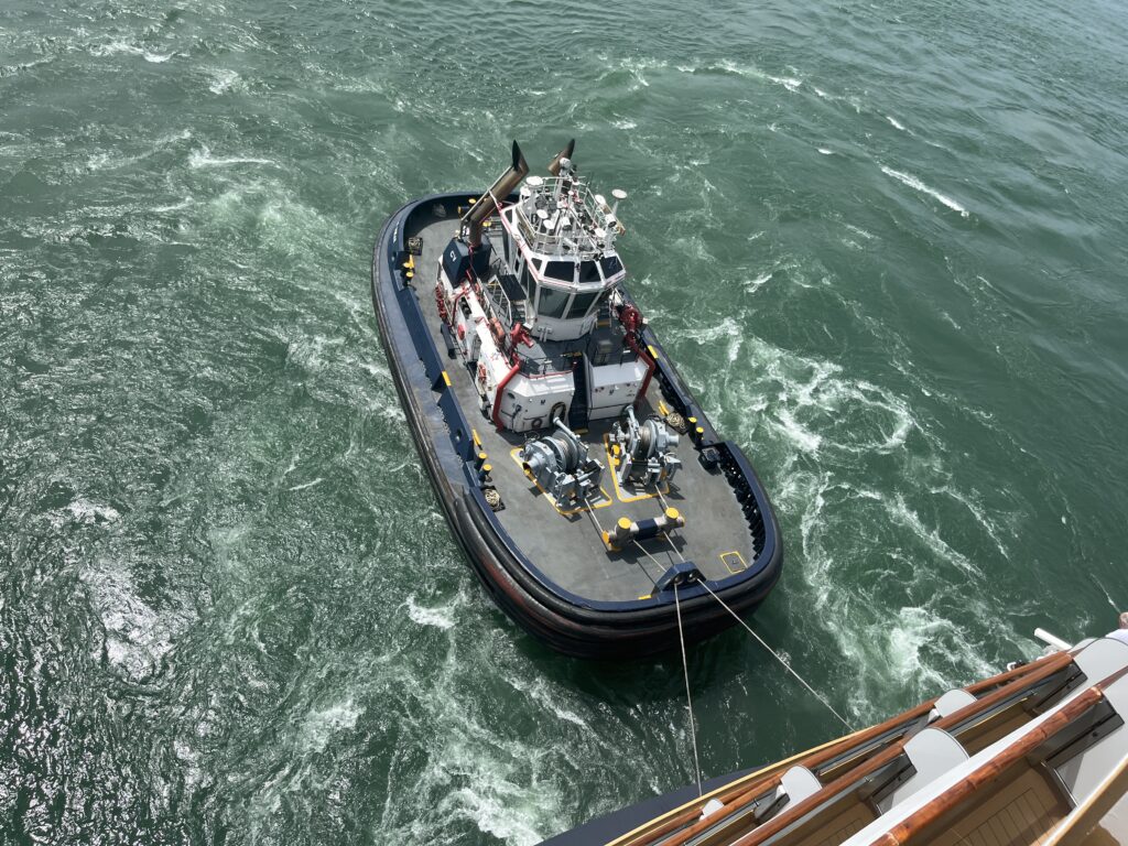 Tug boats are used to hold ships in position inside the lock when using the new Panama Canal locks