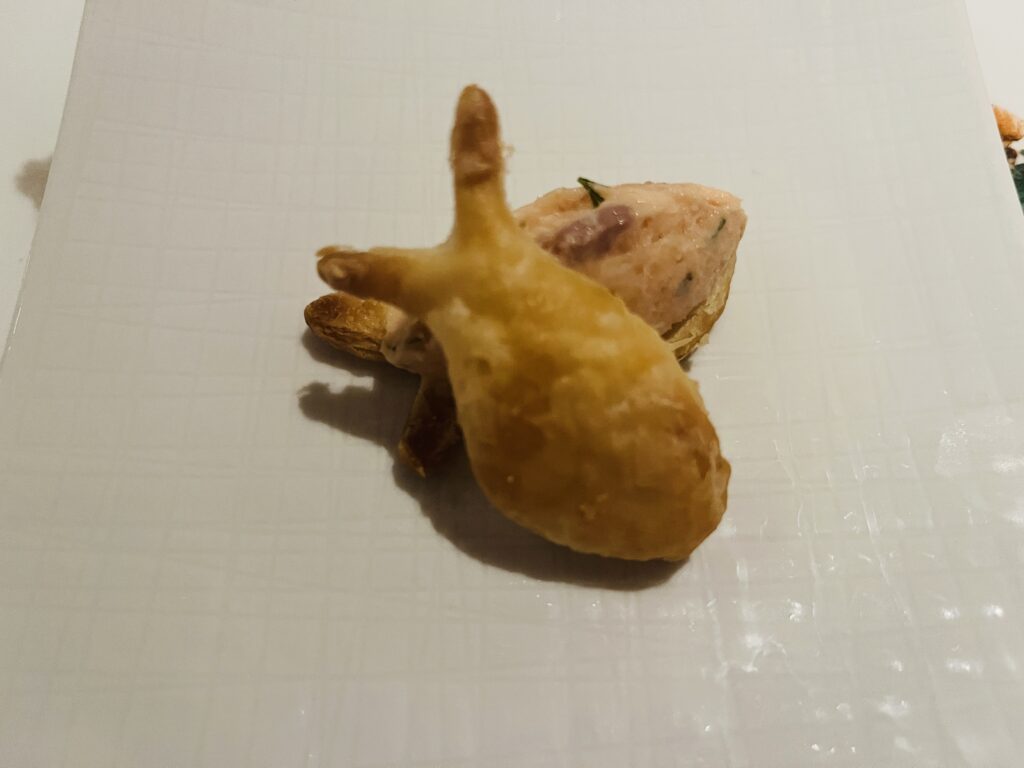 Salmon amuse bouche in the shape of a ... salmon from Rudi's Sel de Mer on Holland America Line's Rotterdam