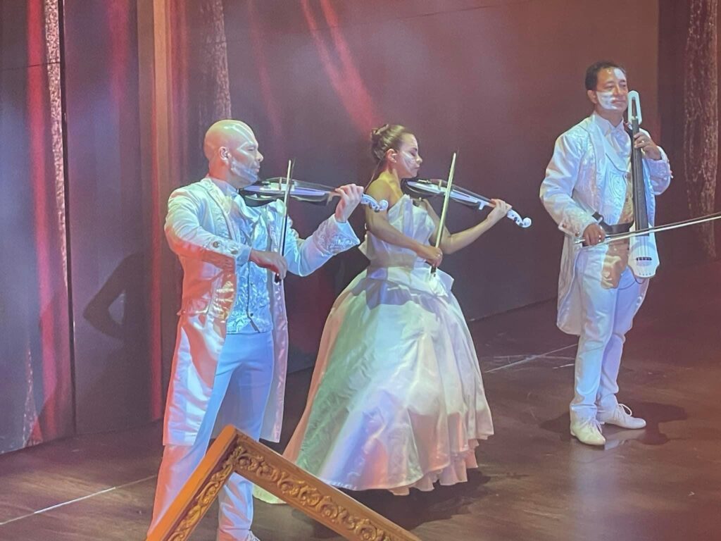 Scenes from Celestial String on Carnival's Mardi Gras