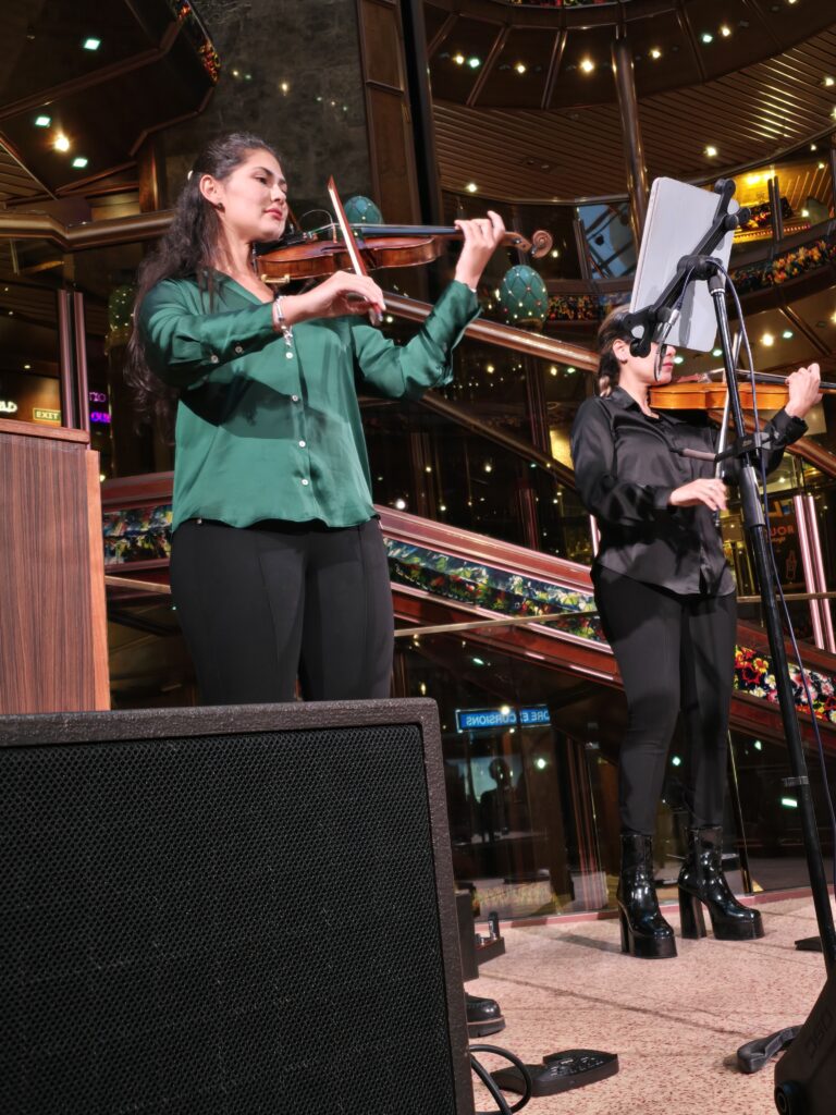 Julie and Daniella entertaining on the Carnival Paradise