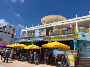 Stores and restaurants line the Boardwalk in St. Maarten