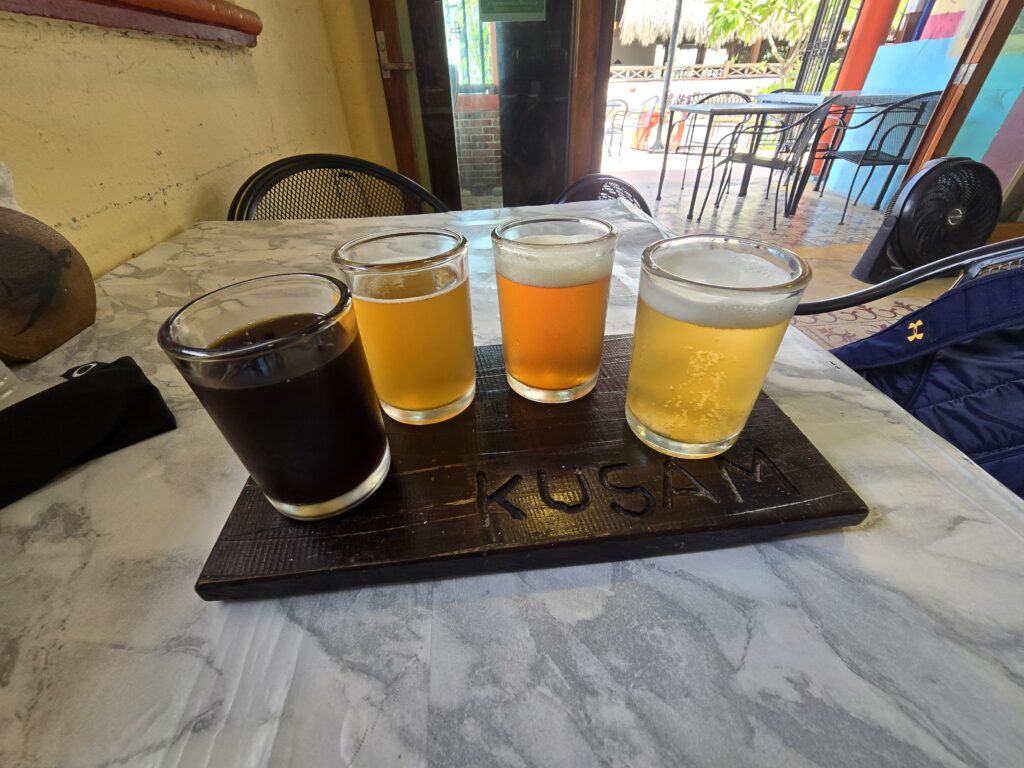 Beer flight at Kusam Brewing in Cozumel, Mexico