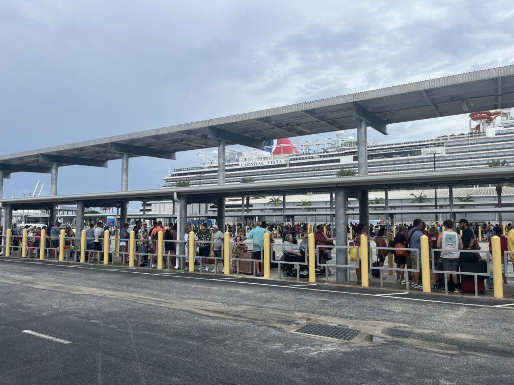 Lines of people waiting to board Carnival Vista at Port Canaveral on September 1, 2024