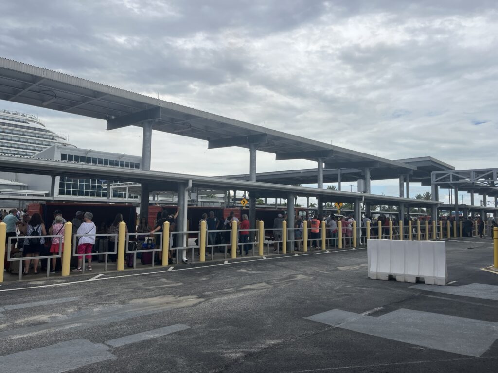 Lines of people waiting to board Carnival Vista at Port Canaveral on September 1, 2024