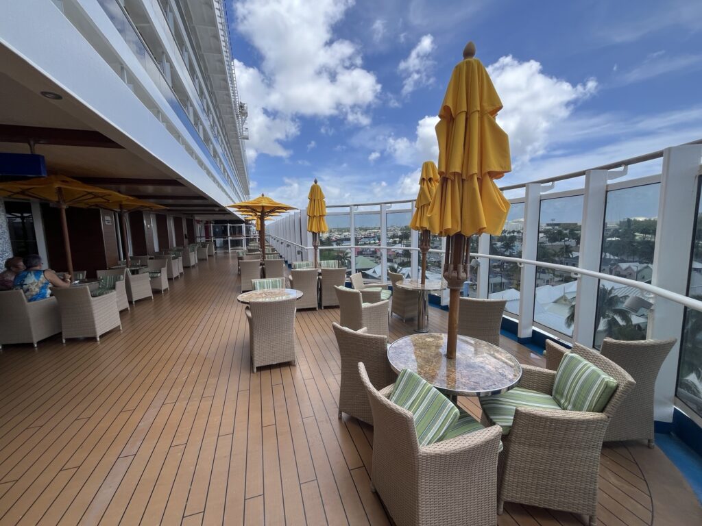 Outdoor seating on Carnival Vista