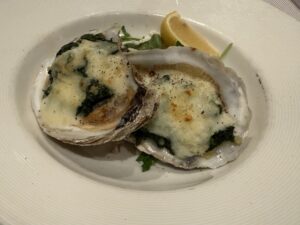 Baked Oysters Rockefeller from the Reserve Collection Dining Room on Enchanted Princess