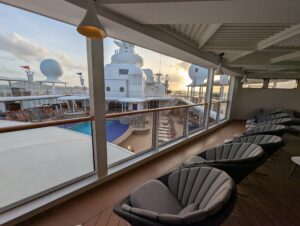 Open air patio on the Concierge Lounge on the Disney Magic