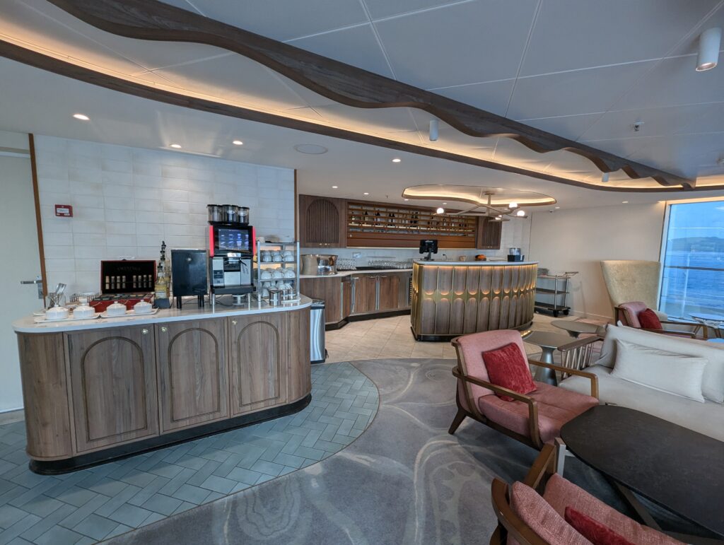 Cappuccino and cocktail bar on the Concierge Lounge on the Disney Magic