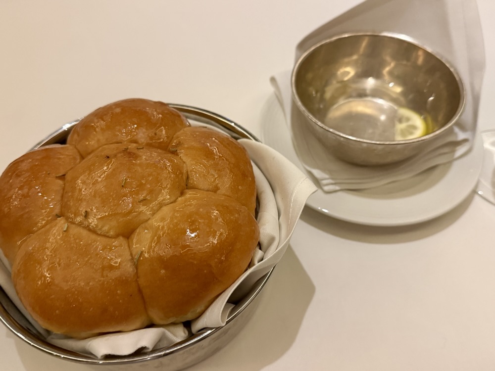 Parker House Rolls and a finger bowl from The Steakhouse at the Verandah on Queen Elizabeth