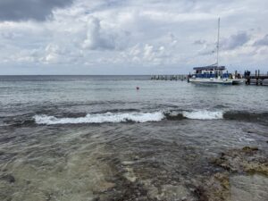 A small "beach" along the main street near the port in Cozumel