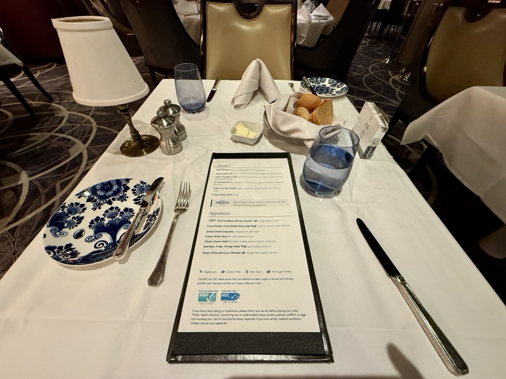 Main dining room placesetting on Zuiderdam