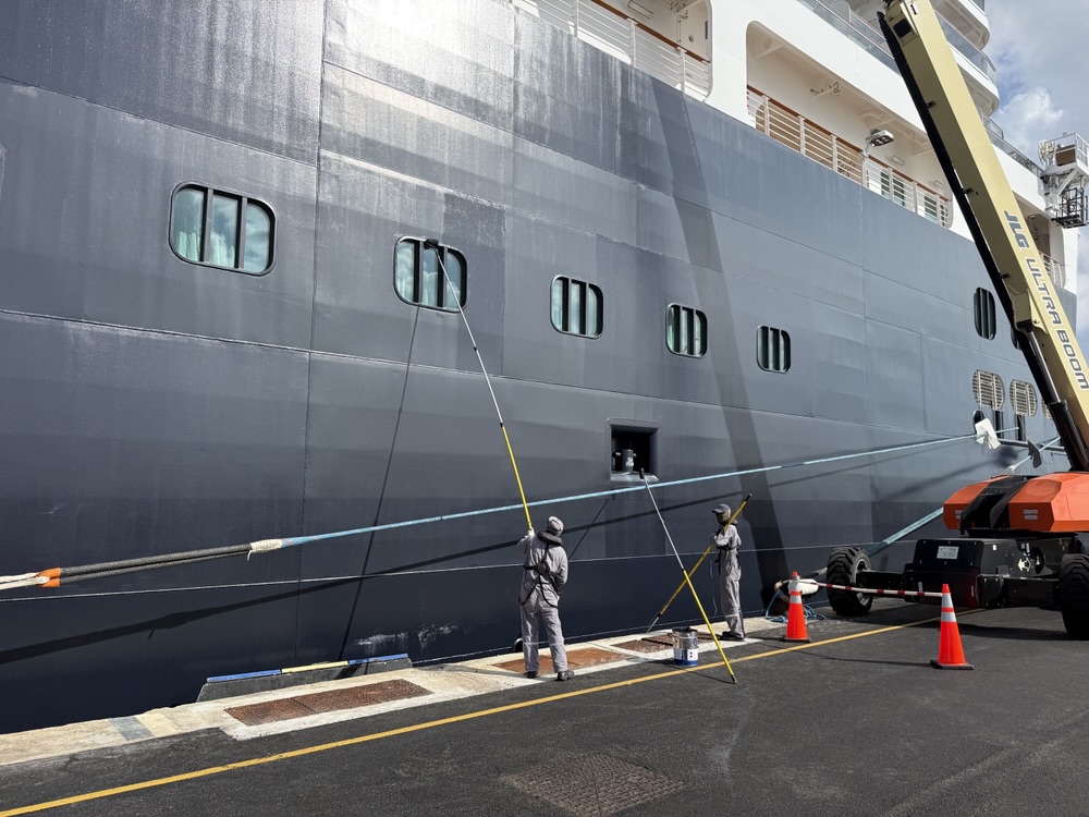 Crew painting the Rotterdam while in port in Barbados on November 23, 2025