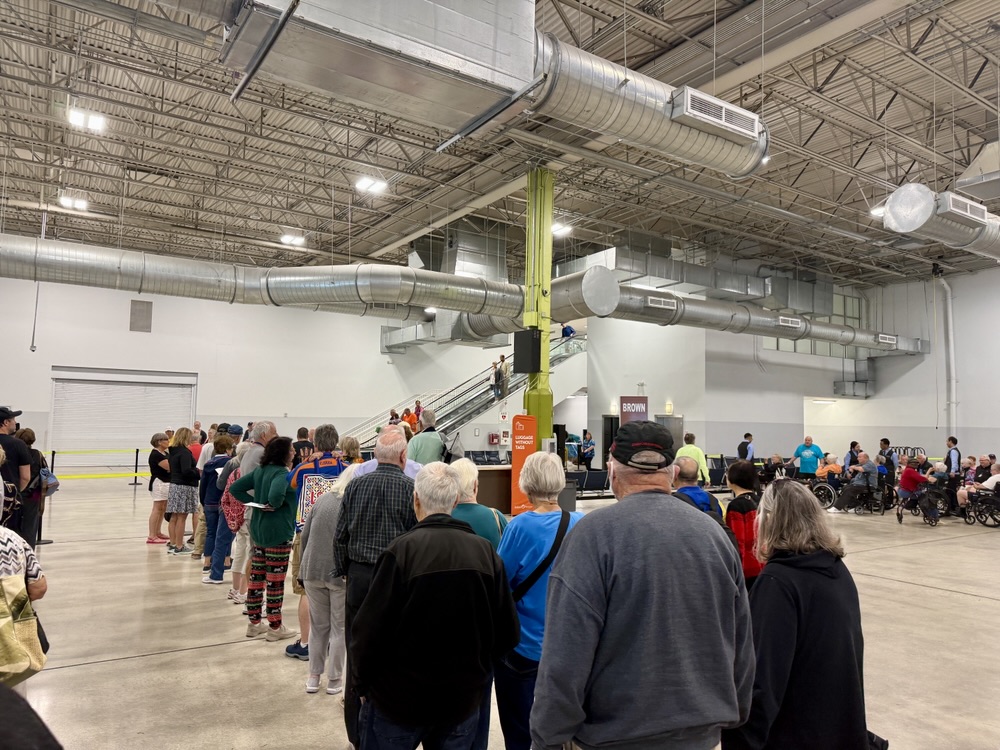 Waiting to re-board the ship after passing through immigration